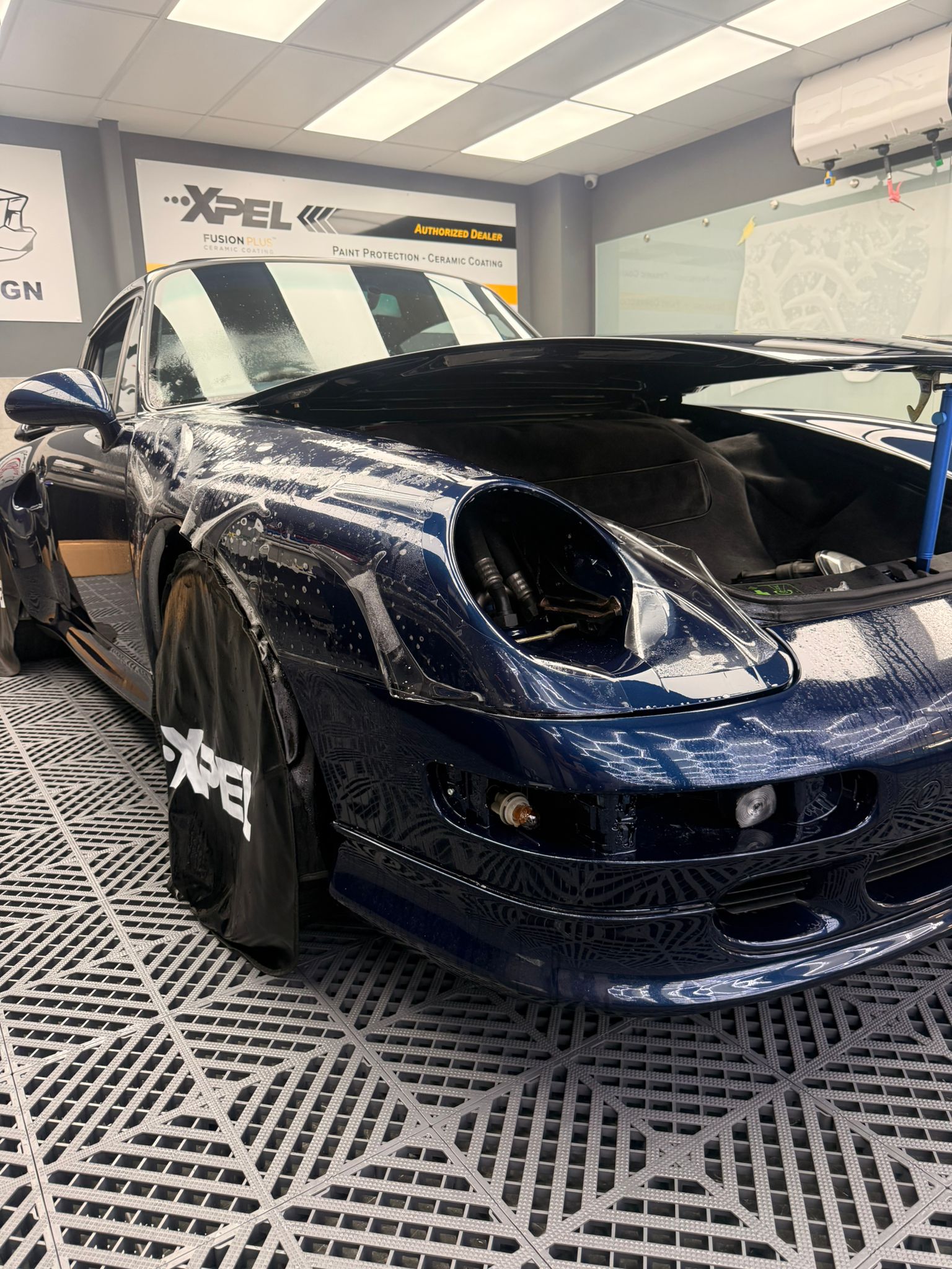 Porsche 993 banner shot after XPEL Ultimate Plus install at EPS PPF Watford