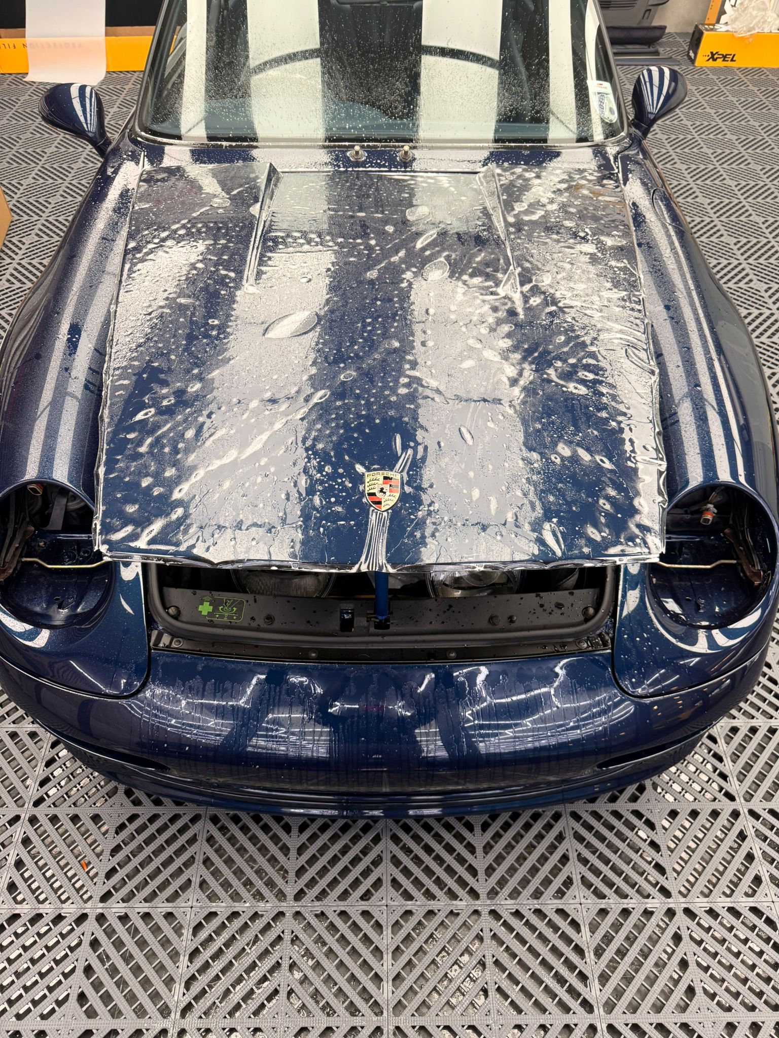 Porsche 993 covered in snow foam during pre-PPF wash